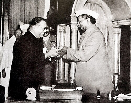 Dr. B.R. Ambedkar presenting the final draft of the Indian Constitution to Dr. Rajendra Prasad (1949)